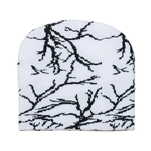 White knitted beanie with black branch patterns in a cool streetwear aesthetic design