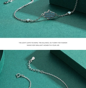Detailed macro view of S925 sterling silver Hamsa Hand bracelet with turquoise beads
