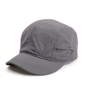 Detail view of grey quick-dry baseball cap with ripstop texture and 5-panel stitching