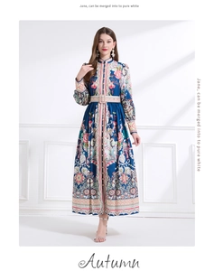Detail of vintage palace style maxi dress with floral print and elegant stand collar