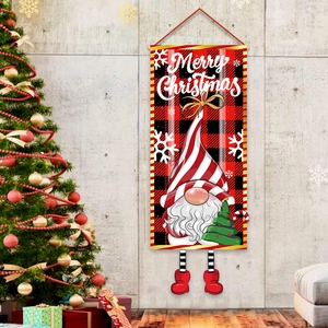 Gnome Merry Christmas door banner hanging decoration with festive tree in indoor setting