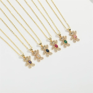 Detailed view of luxury bear pendant necklaces with colorful oval stones and zircon