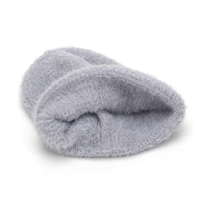 Light gray plush knit hat with cute cat ears design for women in winter season