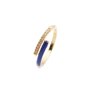 Detailed macro view of a gold-plated adjustable ring with blue enamel and pavé zircons