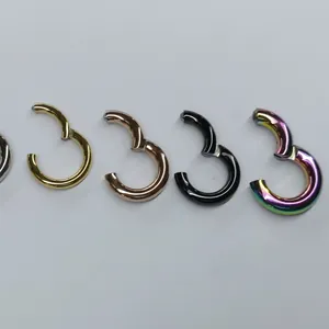 316L stainless steel clicker nose rings in gold, rose gold, black, and rainbow finishes