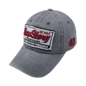 Detail view of washed grey baseball cap featuring 49 embroidery and New Story patch