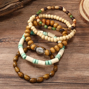 Retro multi-layer wooden bead bracelet set with turquoise accents and flower charm