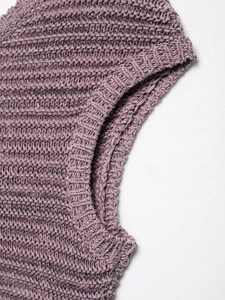 Close-up detail of purple knit vest showing textured shoulder and armhole stitching