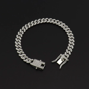 Macro view of 8mm silver Cuban chain link necklace with sparkling rhinestone inlay