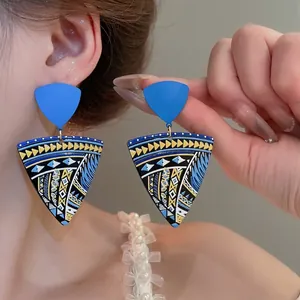 Ethnic blue painted geometric triangle drop earrings with vibrant boho pattern