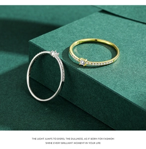 Detail of gold and silver S925 sterling silver rings with square micro-pave crystals