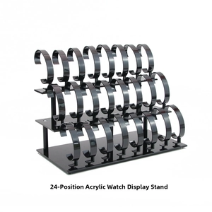 Close-up of a 24-slot black acrylic watch display with a three-tier detachable structure