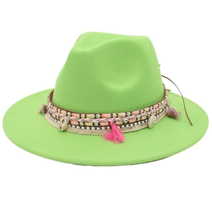 Detail of neon green fedora hat with bohemian woven band, tassels and shell charms