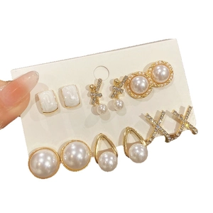 Elegant gold pearl earring set with rhinestone accents and vintage french style studs