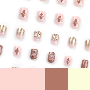 Press-on nails featuring 3D bears, pink diamond plaid patterns and gold glitter accents