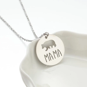 Minimalist silver stainless steel necklace featuring a hollow bear mama round pendant