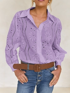 Close-up of purple hollow out embroidery texture on women's long sleeve button shirt