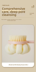 Detail of double-sided bath brush with soft bristles and mesh sponge for deep exfoliation