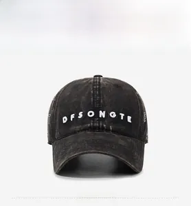 Close-up of DFSONGTE letter embroidery and distressed washed cotton fabric on baseball cap