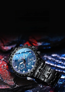 Macro detail of waterproof black steel watch with blue sunray dial and water droplets