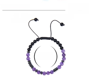 Close-up of Morse code bracelet with 6mm amethyst and black obsidian beads on white