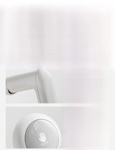 Macro detail of white wall-mounted basin hook with push icon and rounded corners
