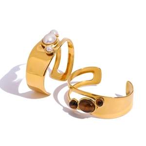 Gold stainless steel open bangles set with white pearl and brown tiger eye stone