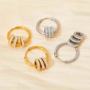 Polished stainless steel hoop earrings with crystal rings in gold and silver finish