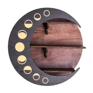 Detail of a dark brown wooden moon shelf featuring decorative moon phases on the frame