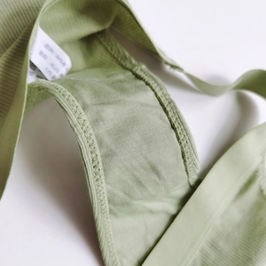 Green ribbed cotton underwear with reinforced stitching and 94% cotton fabric detail