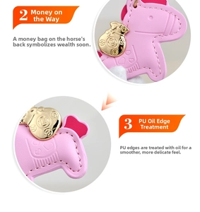 Detailed view of pink leather horse keychain with golden money bag charm and premium stitching