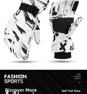 Detail view of winter ski gloves with adjustable wrist strap and anti-slip palm texture