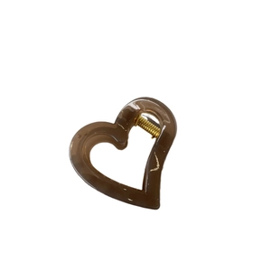 Brown heart-shaped acrylic hair claw clip with gold metal spring for elegant women's styling