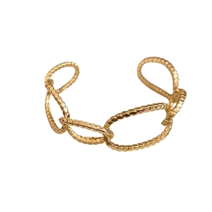 Gold-plated irregular oval open bangle with hammered texture and chain link design