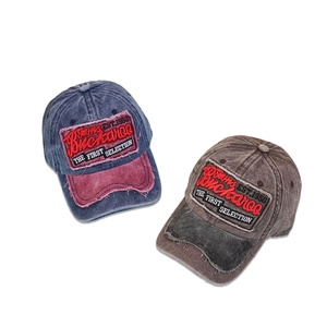 Vintage washed cotton baseball caps with embroidered Buckaroo lettering and worn-out edge