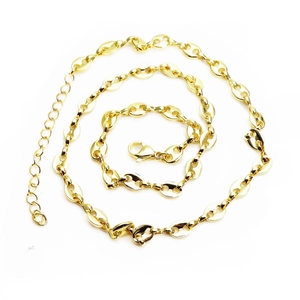 Close-up of golden coffee bean link necklace with lobster clasp and extension chain