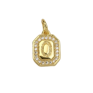Macro shot of 18k gold plated octagonal pendant with sparkling zircon letter O inlay