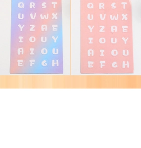 Detail of pink and laser holographic alphabet stickers for DIY scrapbooking craft
