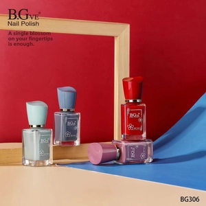 Detail view of four 14ml nail polish bottles in mint green, blue, red and pink