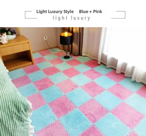 Close-up of interlocking plush foam floor mats in blue and pink for bedroom decor