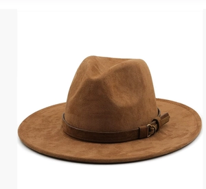 Detailed side view of brown suede fedora hat with elegant buckle leather belt band