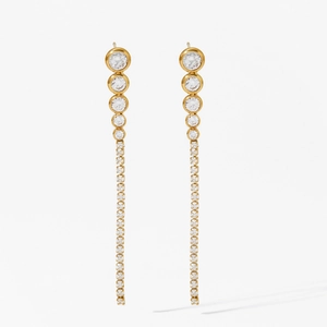 Luxurious gold long tassel earrings with sparkling zircon stones in a vertical design