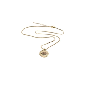 Detail shot of golden evil eye necklace with colorful zircons on fine box chain