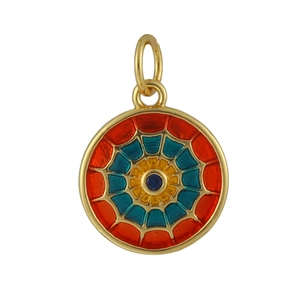 Macro view of round gold plated pendant with colorful enamel and blue center stone inlay