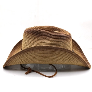 Detail of gradient brown woven straw cowboy hat with adjustable chin strap and curved brim