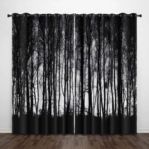 Detail of blackout window curtains featuring black and white forest tree silhouette pattern