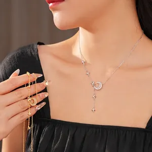 Y-shaped necklace with moon and star zircon pendants in gold and silver finishes