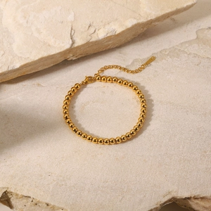 Minimalist 18K gold plated stainless steel bead bracelet with adjustable lobster clasp