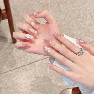Cat eye ice crystal butterfly press-on nails with shimmering nude pink almond shape