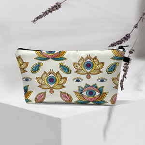 Detail of waterproof cosmetic bag with lotus eye pattern and black zipper on a display stand